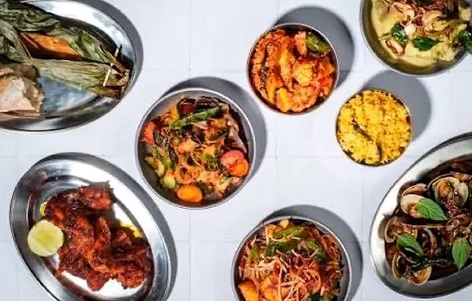 An overhead arrangement of colourful dishes